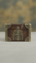 Deck box with embossed medieval motif